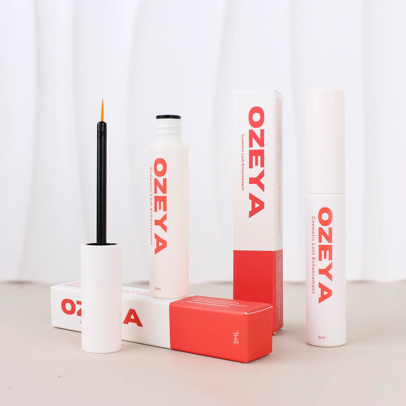 Ozeya cosmetic products on a light background